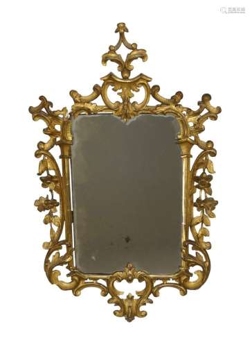 An 18th century carved gilt wood mirror