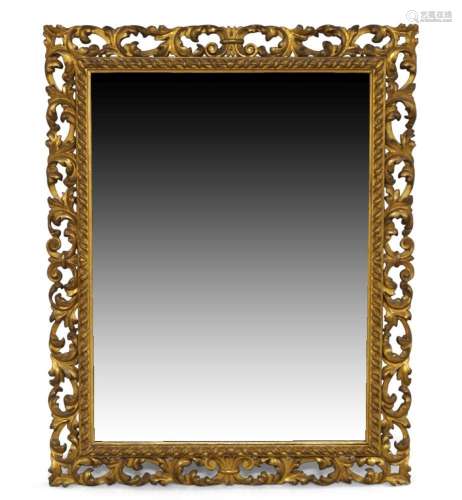 An Italian carved gilt wood mirror