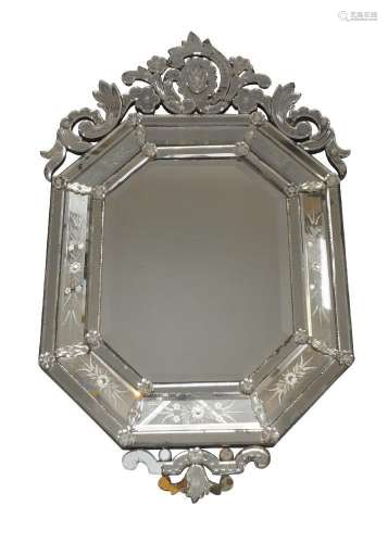 A Venetian style etched glass mirror