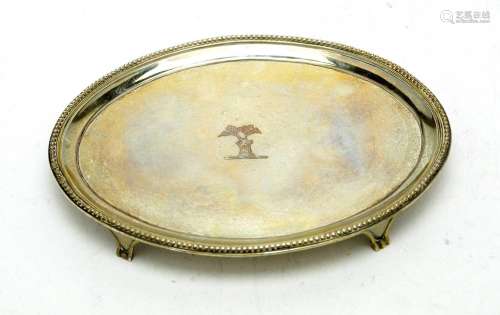 A George III silver teapot stand, by Elizabeth Jones,