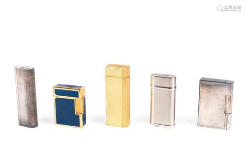 Three Cartier and two S.T. Dupont pocket lighters