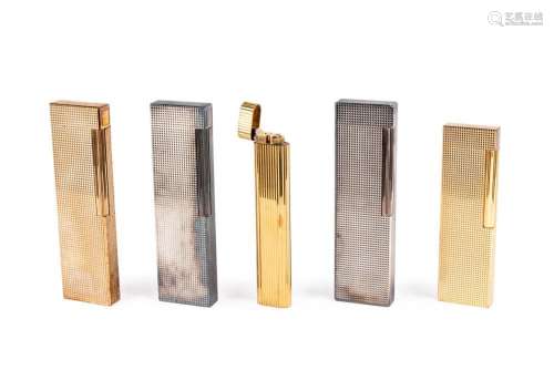 Five table lighters: Dupont and Cartier
