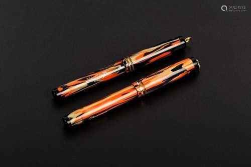 Two Conklin three fifty pens