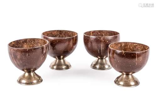 Four silver and coconut cups 20th Century