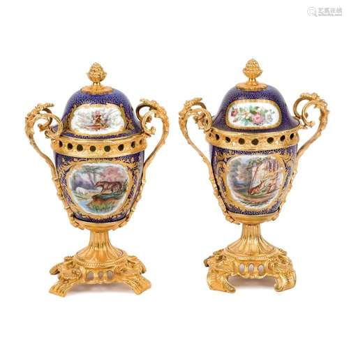 A pair of French porcelain bronze vases. 19th C.