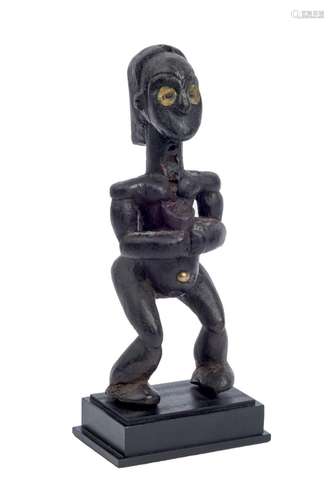 Wood and brass fnag figure