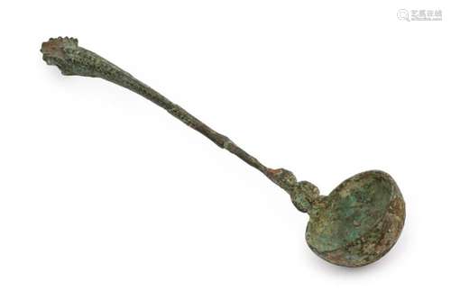 An old Chinese bronze ladle with dragon