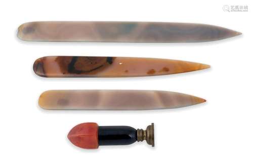 Three aghate letter opener and a seal. 20th C O