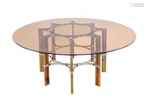 A glass and metal dining table circa 1970