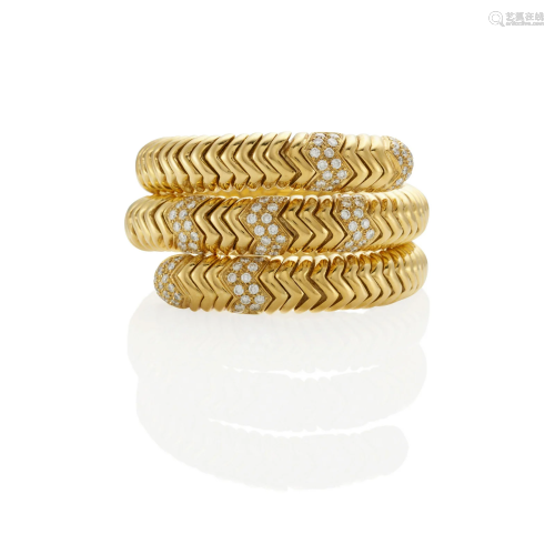 AN 18K GOLD AND DIAMOND CUFF