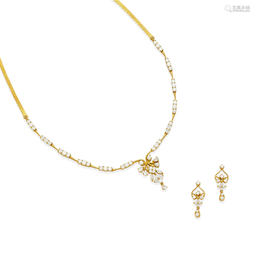 AN 18K GOLD AND DIAMOND NECKLACE AND EARRING SET