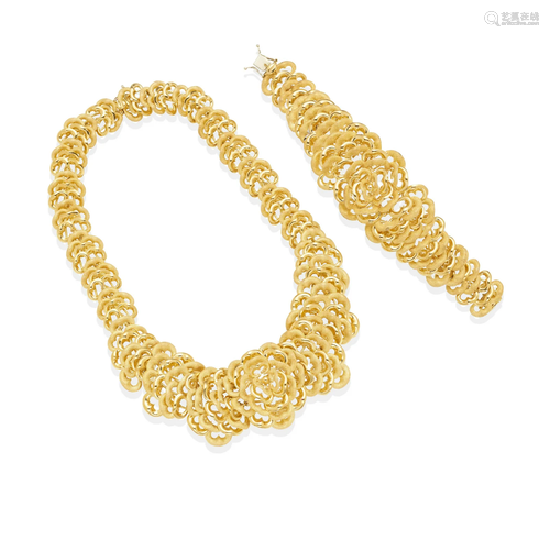 AN 18K GOLD BRACELET AND NECKLACE SET