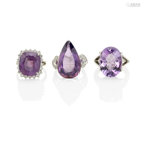 A GROUP OF BI-COLOR GOLD, STERLING, AMETHYST AND DIAMOND RIN...