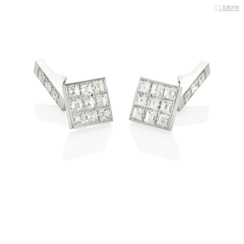 SHILLING: A PAIR OF 18K WHITE GOLD AND DIAMOND CUFFLINKS