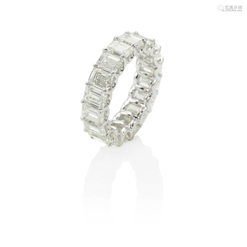 AN 18K WHITE GOLD AND DIAMOND ETERNITY BAND