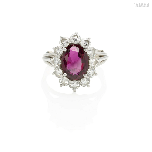 A PLATINUM, RUBY AND DIAMOND RING