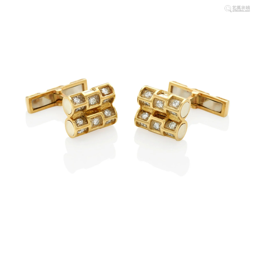 TIFFANY & CO.: A PAIR OF 18K GOLD AND DIAMOND CUFFLINKS