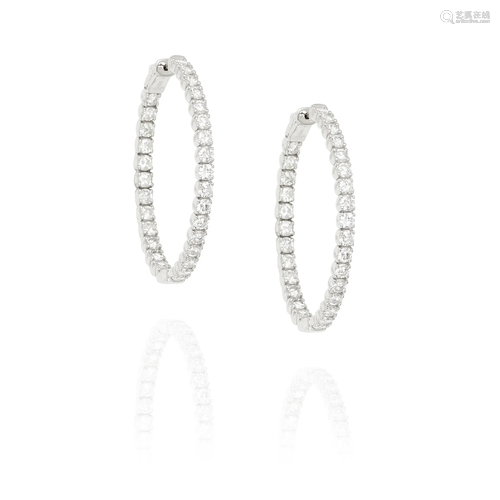 A PAIR OF 14K WHITE GOLD AND DIAMOND HOOP EARRINGS