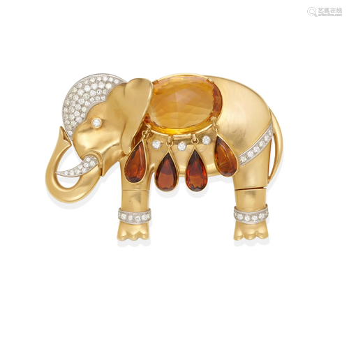 AN 18K GOLD, PLATINUM, CITRINE AND DIAMOND BROOCH