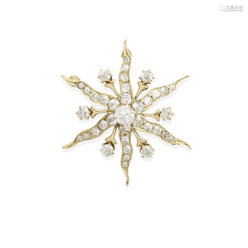 A 14K GOLD AND DIAMOND PENDANT BROOCH