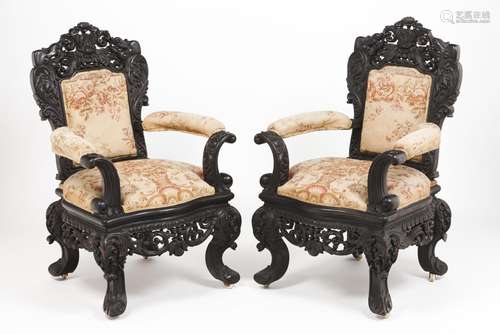 A pair of armchairs