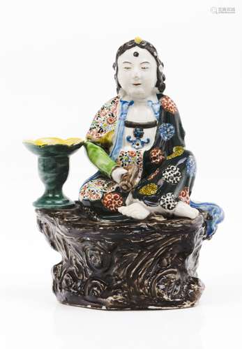 A Guanyin/candlestick