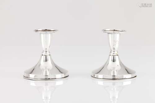 A pair of low candlesticks