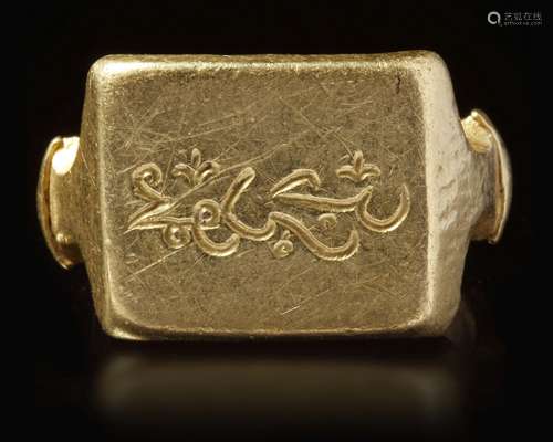 A GOLD SEAL RING