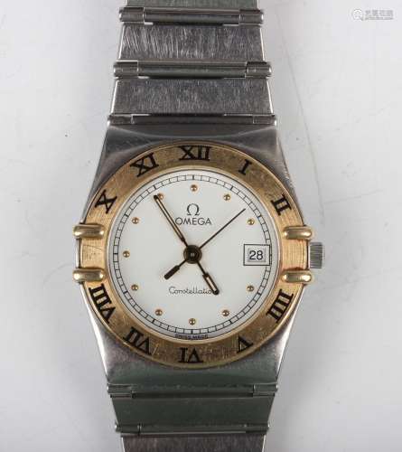 An Omega Constellation steel and gold lady's bracelet wristw...