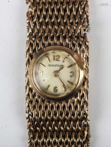 A Jaeger-LeCoultre 9ct gold rear winding lady's bracelet wri...