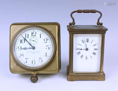 An early 20th century brass cased wall mounted timepiece wit...