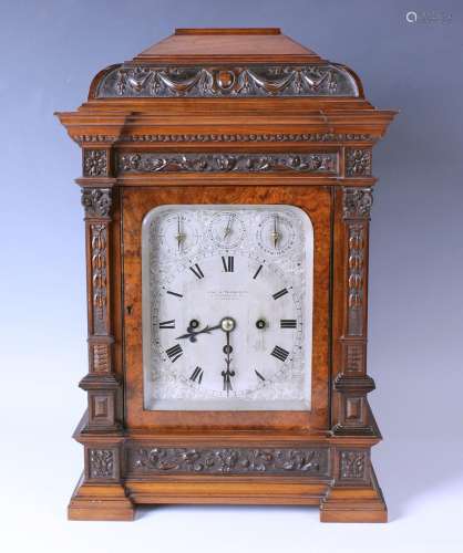 A late Victorian burr walnut cased bracket clock with eight ...