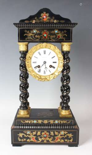 A 19th century French ebonized and gilt metal mounted portic...