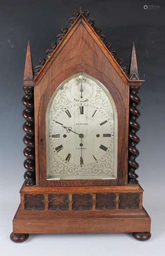A late Victorian Gothic Revival rosewood bracket clock with ...