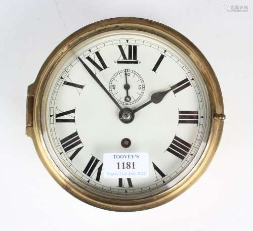 A 20th century brass circular cased ship's style timepiece, ...