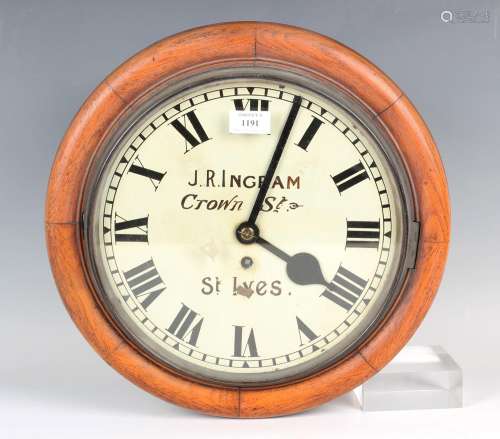 An early 20th century walnut cased circular wall timepiece w...