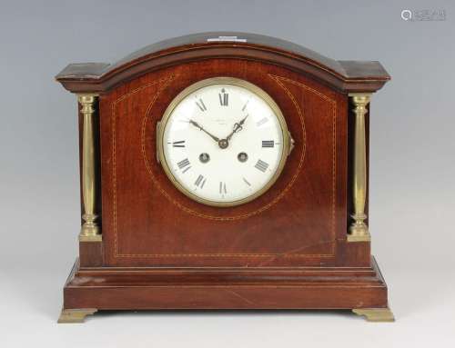 An Edwardian mahogany mantel clock with eight day movement s...