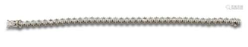 18 kt white gold riviere bracelet.