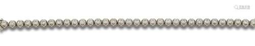 18 kt white gold riviere bracelet.