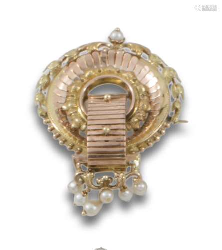 Alfonsino brooch in 14 kt yellow and rose gold.