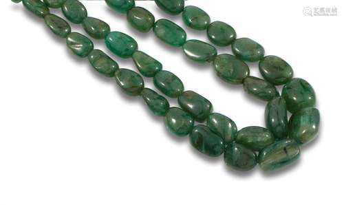 Necklace of two strands of cabochon emerald beads