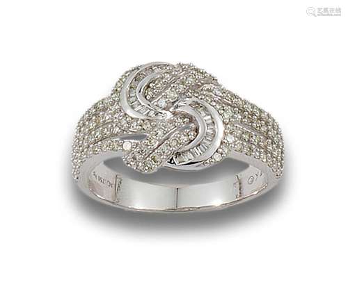 18 kt white gold knot ring.