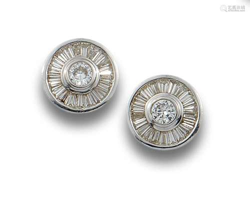 18 kt white gold bird s eye earrings.