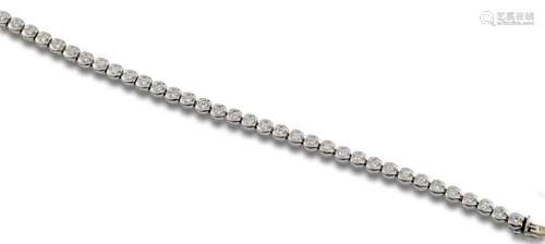 18 kt white gold riviere bracelet.