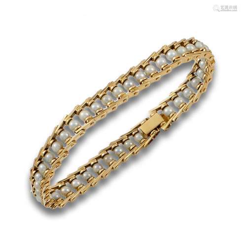 Bracelet, 1970s, 18 kt yellow gold.