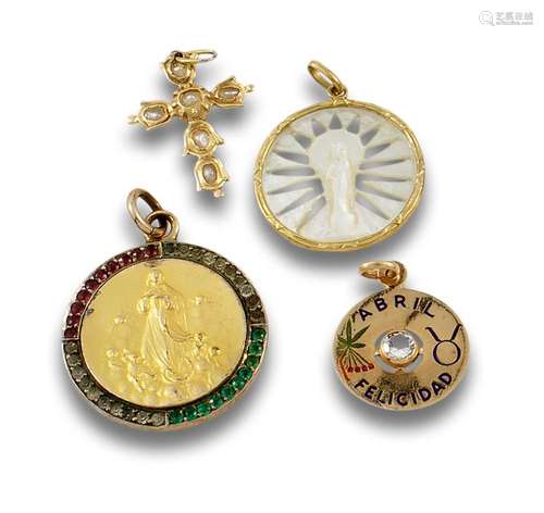 Lot consisting of three medals and a cross in 18 kt yellow g...