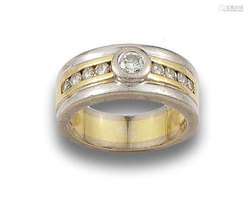 18 kt white and yellow gold ring.