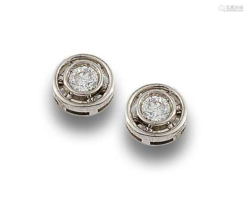 18 kt white gold sleeper earrings.