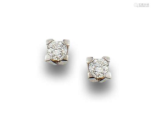 18 kt white gold sleeper earrings.