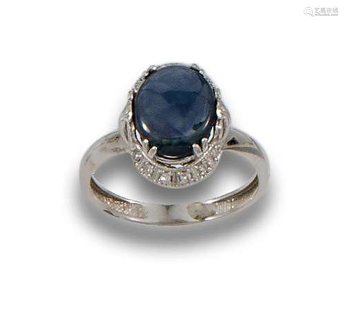 18 kt white gold antique style ring.